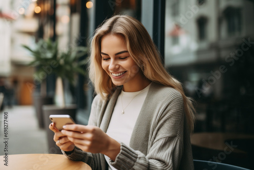 woman talking on mobile phone in cafe