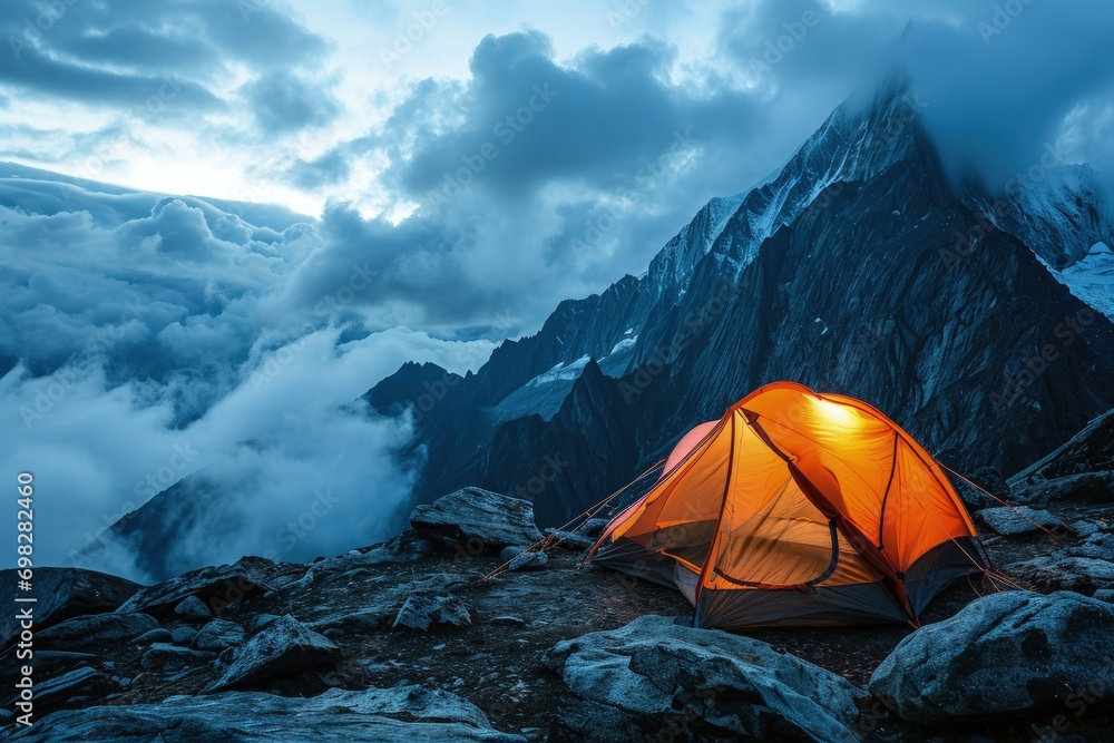A Tent Perched on a Majestic Mountain Peak