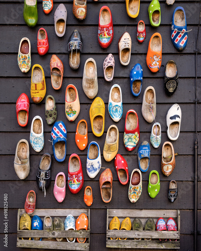 Assemblage of typical Dutch shoes painted with different colors and motifs