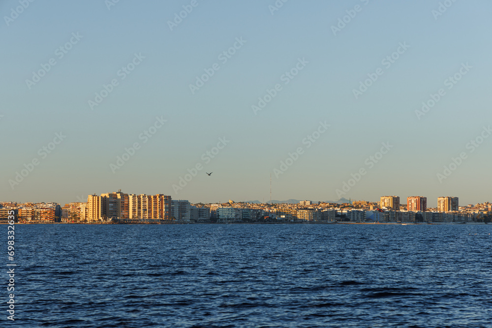 View of Torrevieja from the sea at sunset.