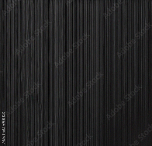 Black Wooden Background. Dark textured surface with empty copy space for text. Minimalist backdrop. Blank template design