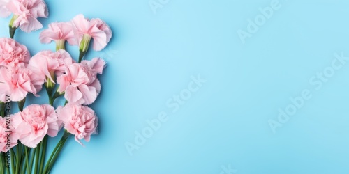 Spring flowers. Bouquet of flowers on pastel blue background. Valentine's Day, Easter, Birthday, Happy Women's Day, Mother's Day. Flat lay, top view, copy space for text © megavectors