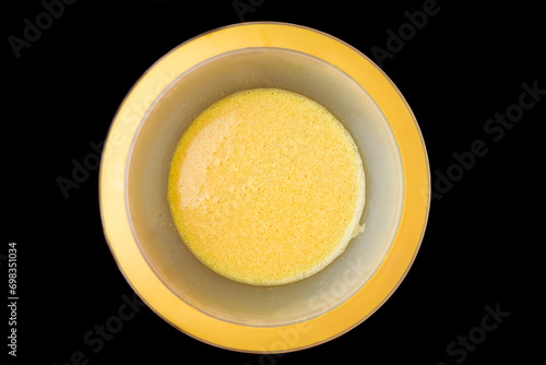 An omelet is ready when raw eggs are stirred together.