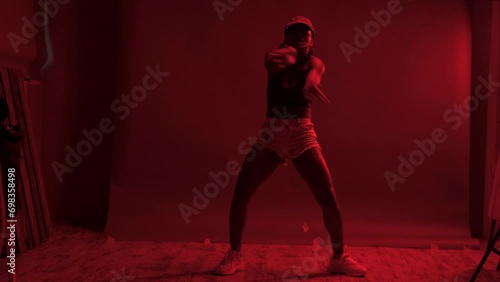Black woman dancing at studio	
