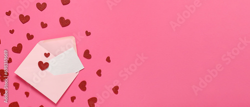 Envelope and many red hearts on pink background with space for text, top view. Valentine's Day celebration © Pixel-Shot