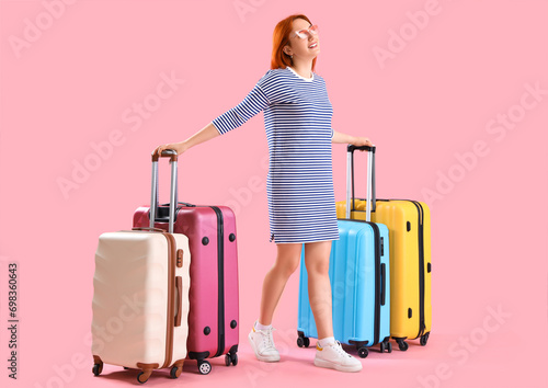Female tourist with many su...