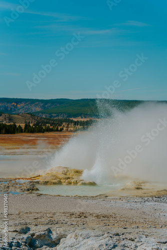 Geyser Eruption Lower Geyser Basin, explosion steam in Yellowstone National Park in Wyoming