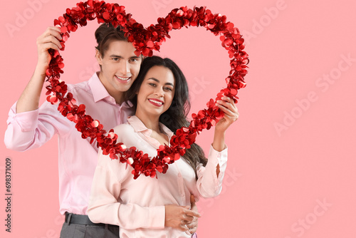 Young couple with heart on ...