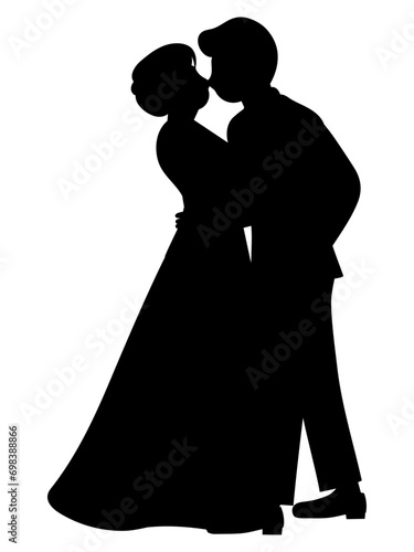 結婚式でキスをする新郎新婦のシルエット
