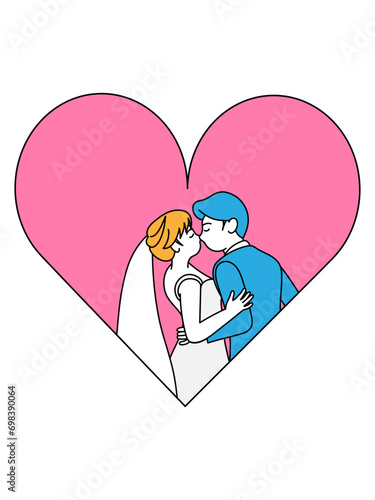 ハートマークの中でキスをする新郎新婦