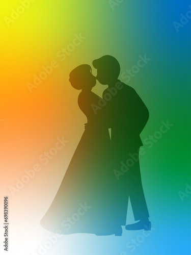 結婚式でキスをする新郎新婦のシルエット