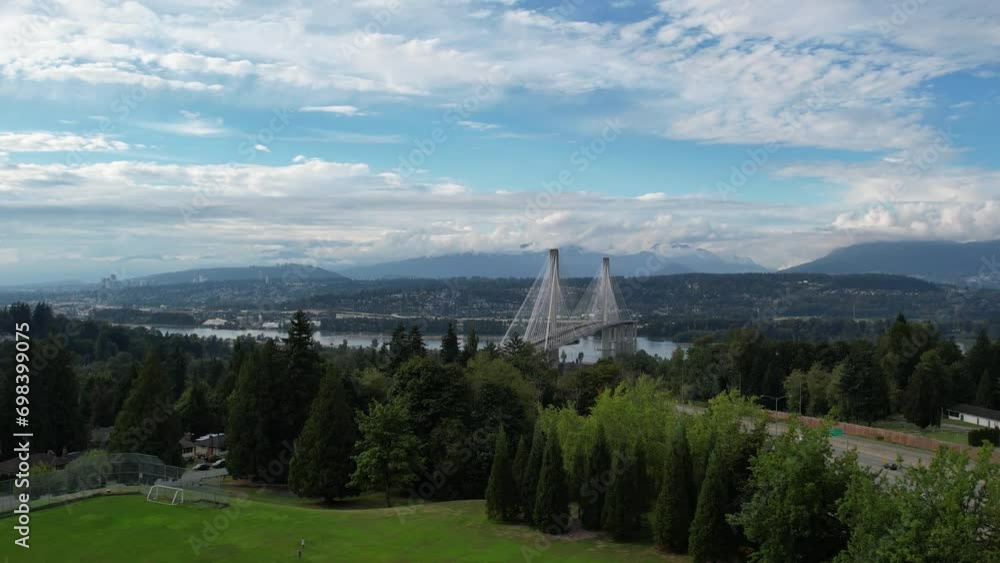 Port Mann Bridge. Vancouver, British Columbia, Canada, over Fraser River, connecting Surrey to Port Coquitlam. 4K Aerial video of the bridge with usual traffic. Port Mann Bridge. Vancouver, British Columbia, Canada, over Fraser River, connecting Surrey to Port Coquitlam. 4K Aerial video of the bridge with usual traffic.
