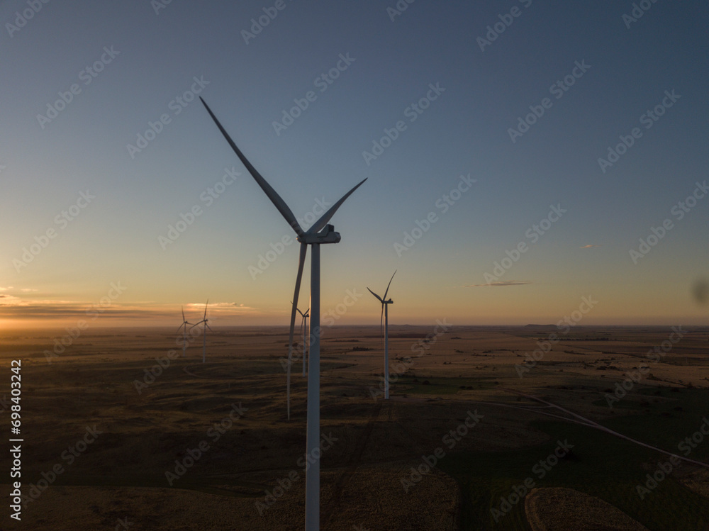 wind turbines at sunset wind turbines at sunset