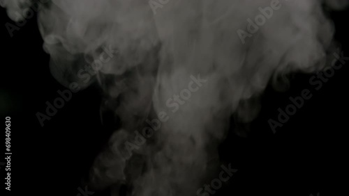 White smoke,steam on a black background. Slow motion. Shot in 4K resolution at 60fps. #10 photo