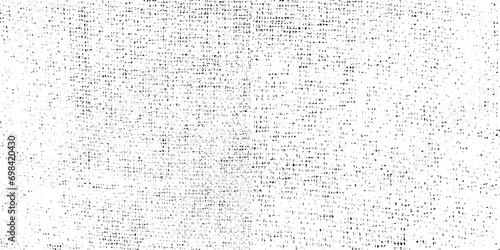 Distressed overlay texture of weaving fabric, cloth knitted. Grunge black and white abstract monochrome background.