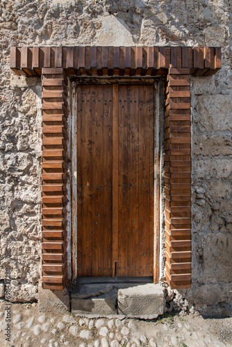 Old historical colorful doors and shutters made of wrought iron and wood. Old historical wooden doors in Cyprus. Doors and shutters of historical stone houses in Nicosia.