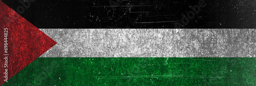 Close up Palestine grunge flag banner. Dirty Palestine flag on a metal surface. Banner design