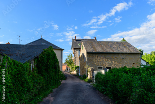 A traditional village old seaside resort in the middle of the countryside in Europe, France, Burgundy, Nievre, Saint-Honoré-les-Bains, towards Chateau Chinon, in summer on a sunny day.