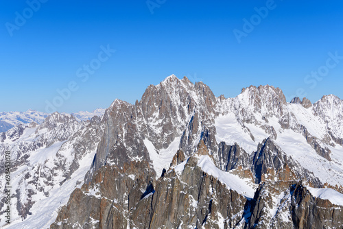 Aiguille Verte, Du Jardin, Les Drus and Les Droites in Europe, France, Rhone Alpes, Savoie, Alps, in winter on a sunny day. photo