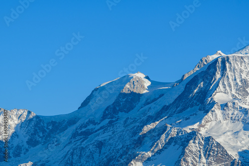 Mont Blanc du Tacul snow capped in Europe, France, Rhone Alpes, Savoie, Alps, in winter on a sunny day. © Florent