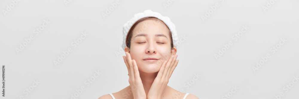 Beautiful young woman with clean perfect glowing skin Beautiful young woman with clean perfect glowing skin