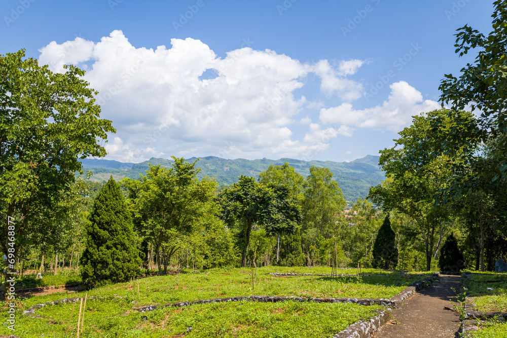 The gardens around the victory monument , in Asia, Vietnam, Tonkin, Dien Bien Phu, in summer, on a sunny day.