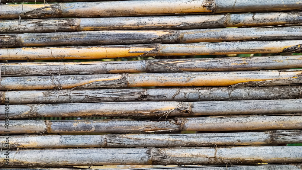 Background texture of dry bamboo cane, flat lay, vertical frame, close-up