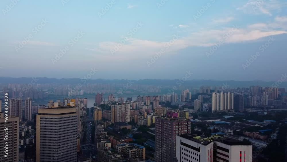 Cinematic aerial view of cityscape with skyscrapers and dramatic polluted sky in Chongqing, China Cinematic aerial view of cityscape with skyscrapers and dramatic polluted sky in Chongqing, China
