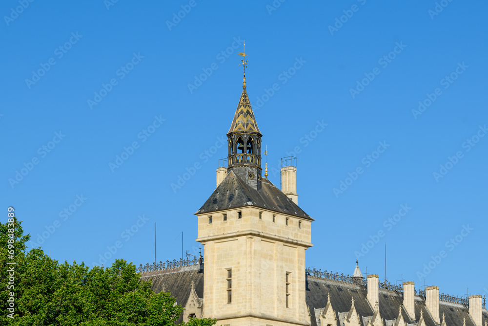 The Clock Tower of the Palais de la Cité , Europe, France, Ile de France, Paris, in summer on a sunny day.