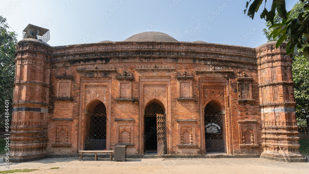Landscape view of the facade of ancient brick and terracotta Khania Dighi mosque aka Chamchika or Rajbibi, Shahabazpur, Chapai Nawabganj, Bangladesh