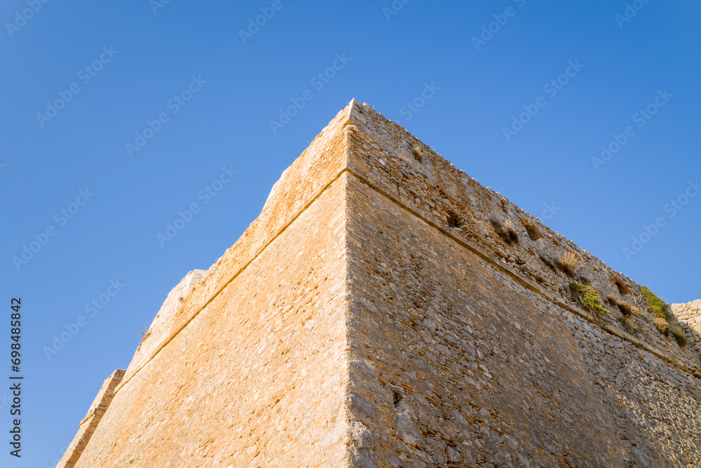 The stone interior of Palamidi fortress , Europe, Greece, Peloponnese, Argolis, Nafplion, Myrto seashore, in summer on a sunny day. The stone interior of Palamidi fortress , Europe, Greece, Peloponnese, Argolis, Nafplion, Myrto seashore, in summer on a sunny day.
