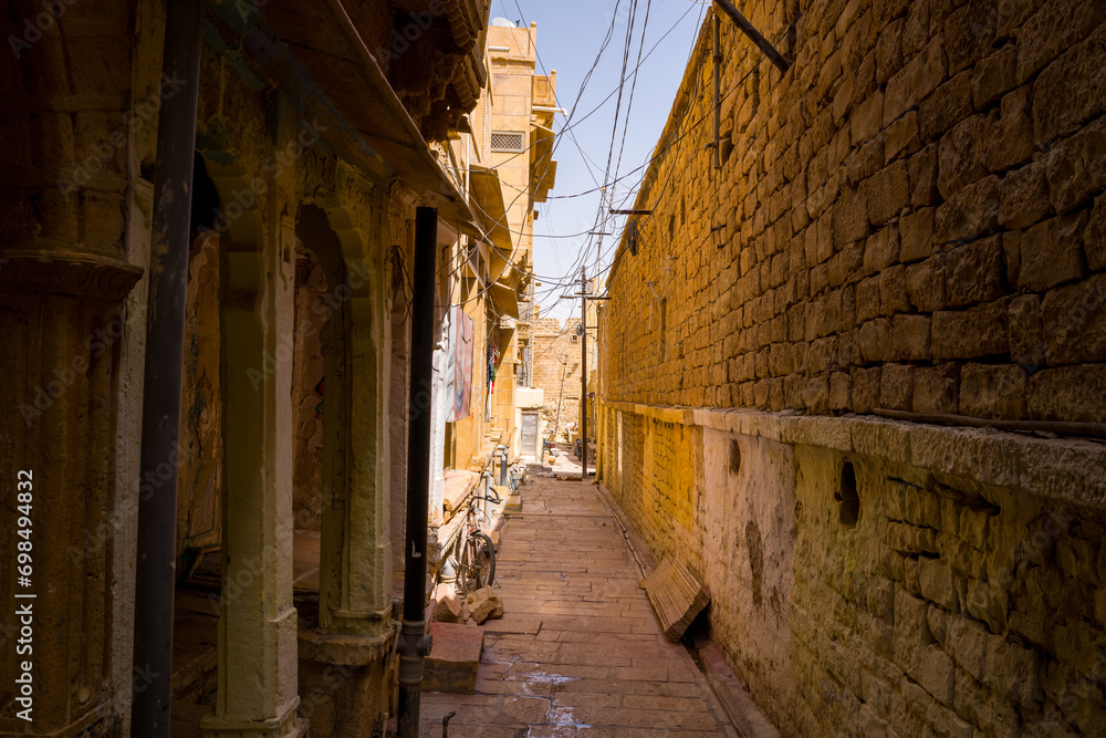 The Alleys of Jaisalmer Fort in Asia, India, Rajasthan, Jaisalmer, in the summer on a sunny day. The Alleys of Jaisalmer Fort in Asia, India, Rajasthan, Jaisalmer, in the summer on a sunny day.
