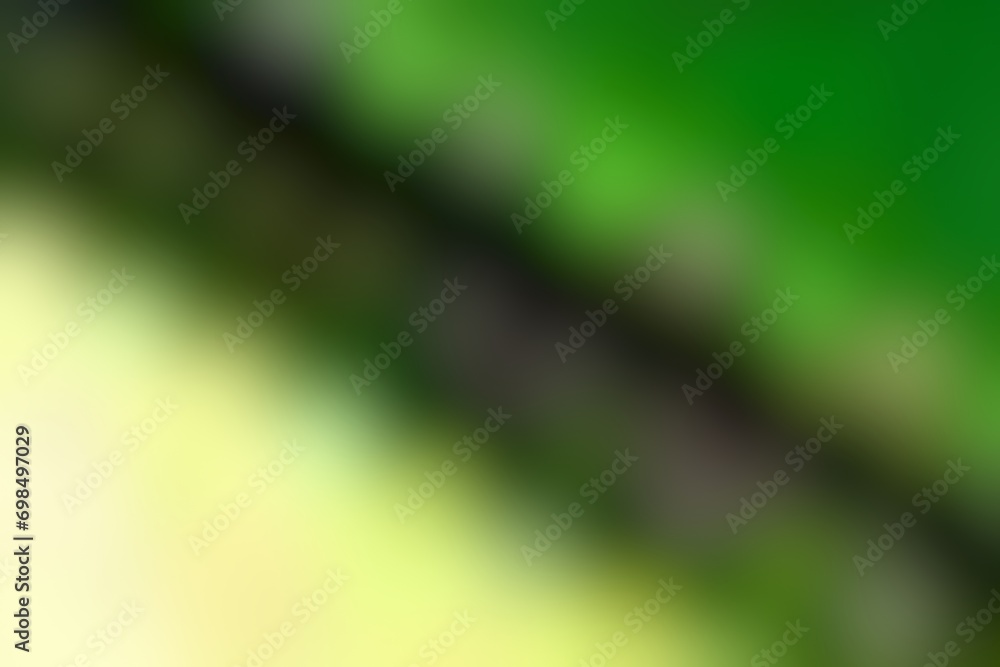 Abstract blurred background image of green, yellow colors gradient used as an illustration. Designing posters or advertisements. Abstract blurred background image of green, yellow colors gradient used as an illustration. Designing posters or advertisements.