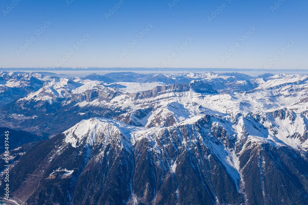 Aiguillette des Houches and Lake Geneva in Europe, France, Rhone Alpes, Savoie, Alps, in winter on a sunny day.