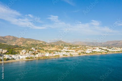 The paradise coast and the sandy beach at the foot of the mountains  in Europe  Greece  Crete  Analipsi  By the Mediterranean Sea  in summer  on a sunny day.