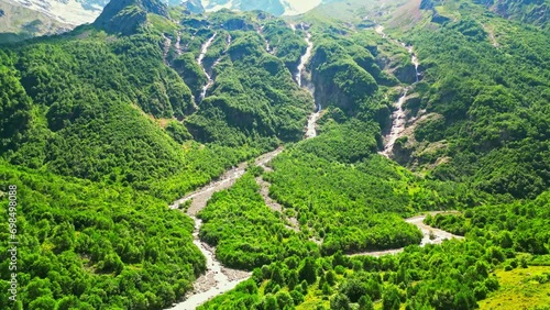 view from the height of a huge waterfall in summer photo