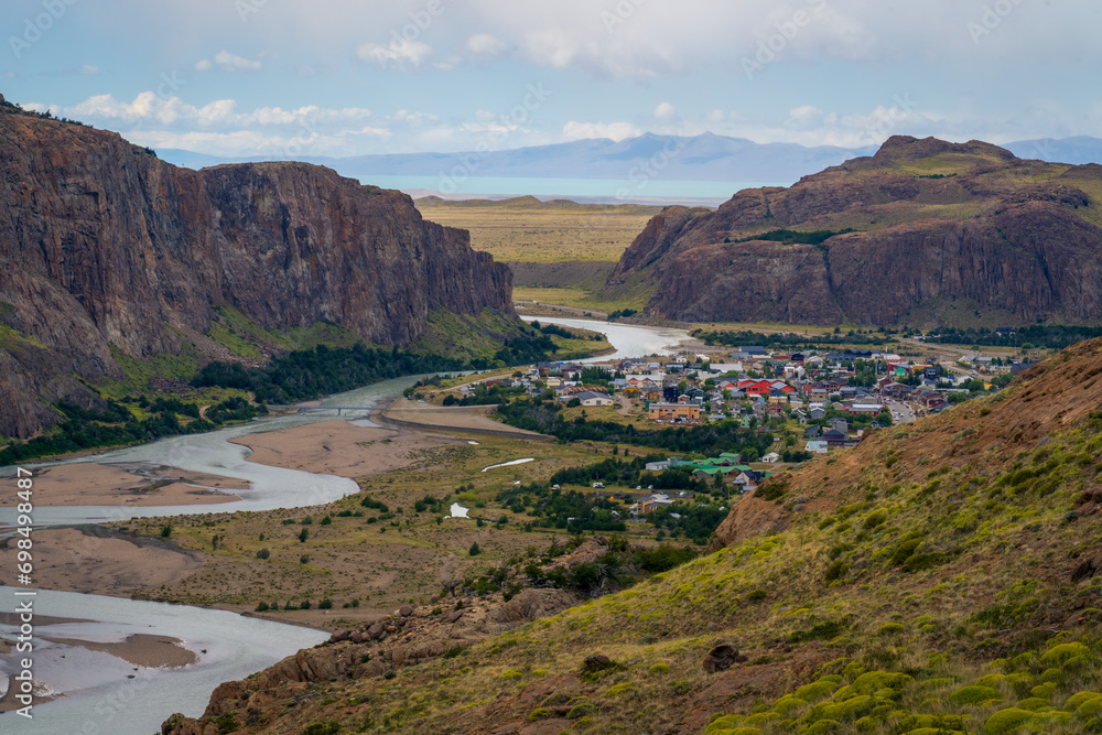 View of river that leads to el chalten city with mountains as background (patagonia, argentina)