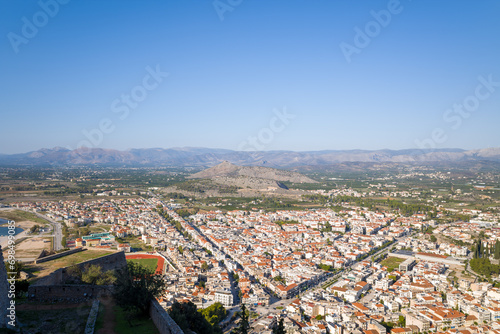 A panoramic view of the city center and arid countryside , Europe, Greece, Peloponnese, Argolis, Nafplion, Myrto seaside, in summer on a sunny day. © Florent