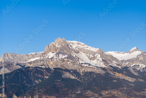 The panoramic view of Tete du Colonney, Aiguille Rouge and Varan in Europe, France, Rhone Alpes, Savoie, Alps, in winter on a sunny day. © Florent