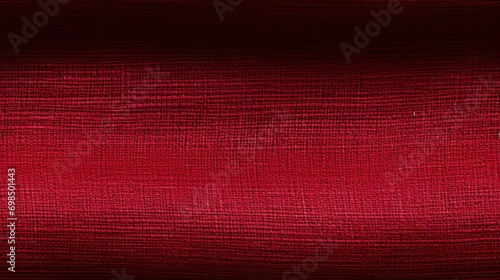  a close up of a red cloth textured with a small amount of stitching on the side of the fabric.