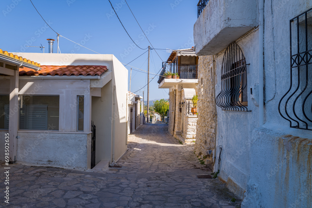 The alleys of the city center , in Europe, in Greece, in Crete, in Argiroupoli, towards Rethymno, in summer, on a sunny day.