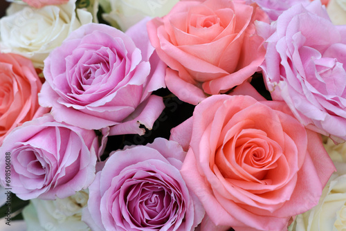 Beautiful bouquet of aromatic roses as background, closeup