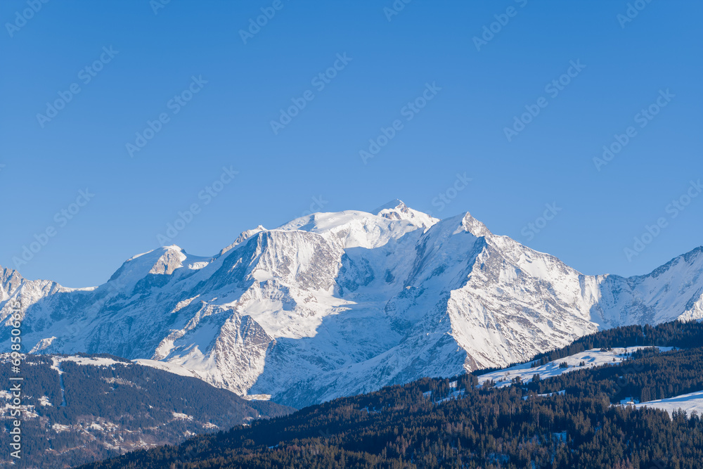 Mont Blanc massif after snowfall in Europe, France, Rhone Alpes, Savoie, Alps, in winter on a sunny day. Mont Blanc massif after snowfall in Europe, France, Rhone Alpes, Savoie, Alps, in winter on a sunny day.