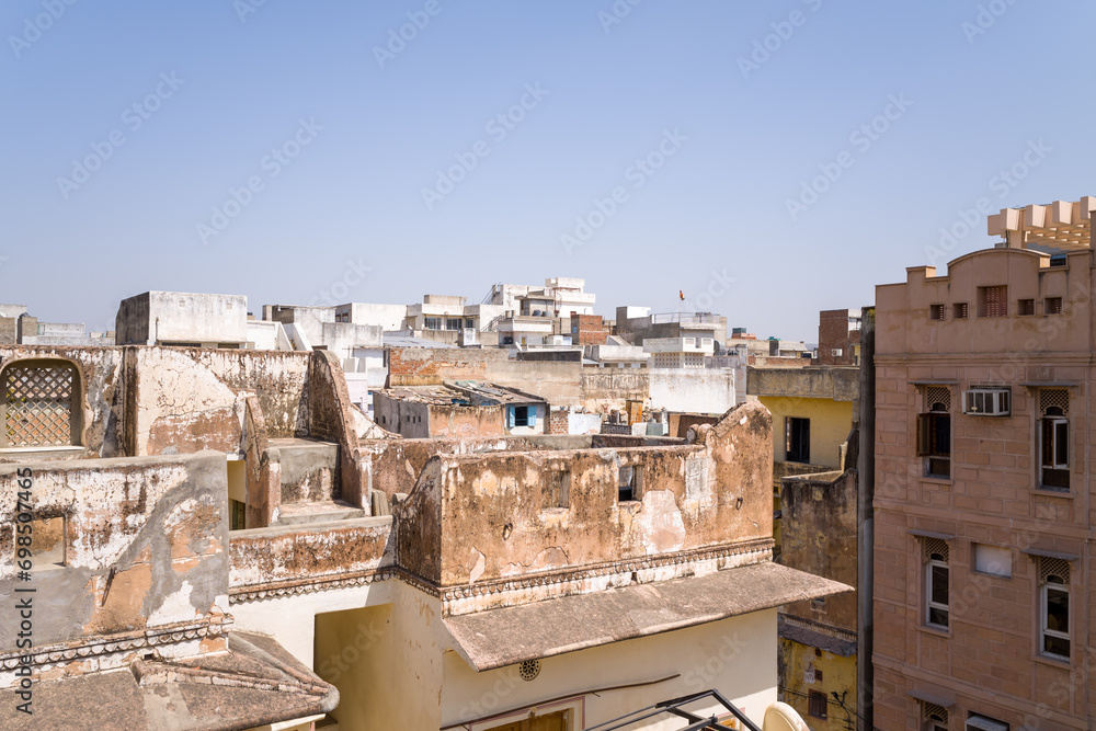 The old buildings in the city center in Asia, India, Rajasthan, Jaipur, in summer on a sunny day.