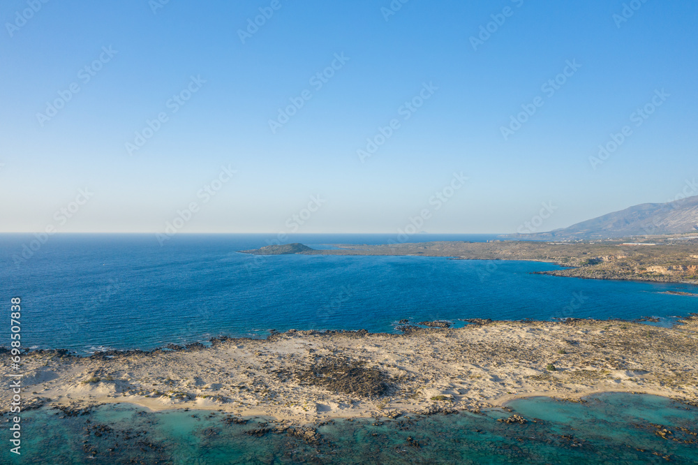The rocky coast of the peninsula , Europe, Greece, Crete, Elafonisi, By the Mediterranean Sea, in summer, on a sunny day.