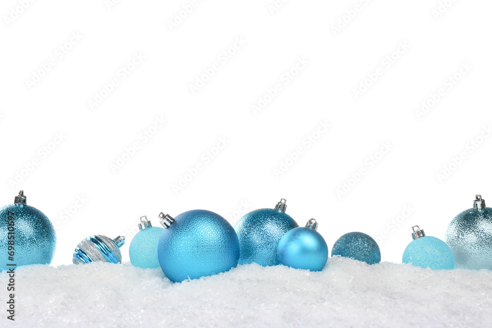 Beautiful light blue Christmas balls on snow against white background Beautiful light blue Christmas balls on snow against white background