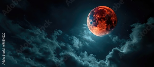 Total lunar eclipse with super blue blood moon against dark sky