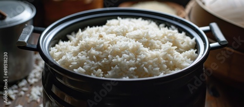 Just-cooked white rice in a cooker. photo