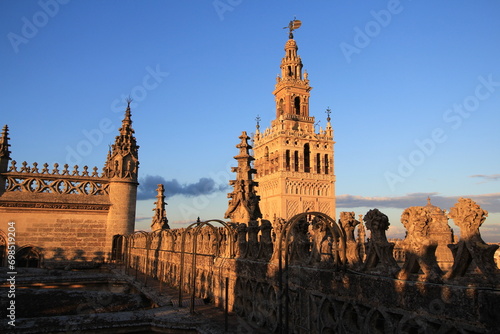 La Giralda, a former minaret of the great mosque of Seville (Spain), later converted to a bell tower for the Cathedral. photo