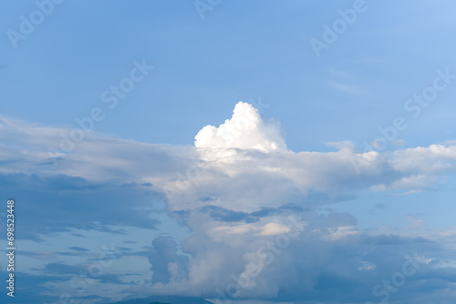 A thunderstorm in preparation in the middle of green and yellow rice fields and mountains, in Asia, in Vietnam, in Tonkin, in Dien Bien Phu, in summer, on a sunny day.